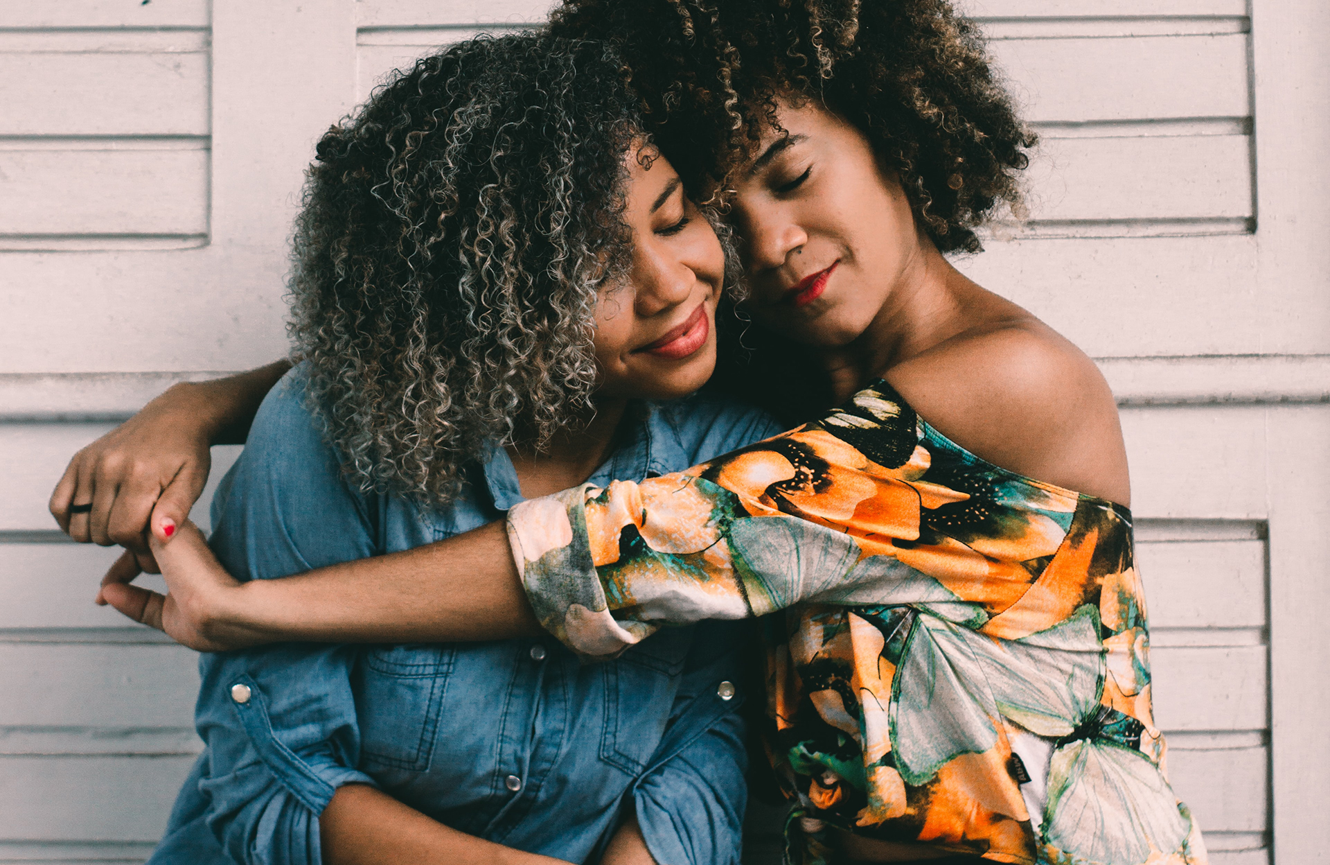 Black-women-hugging Blaxk women hugging