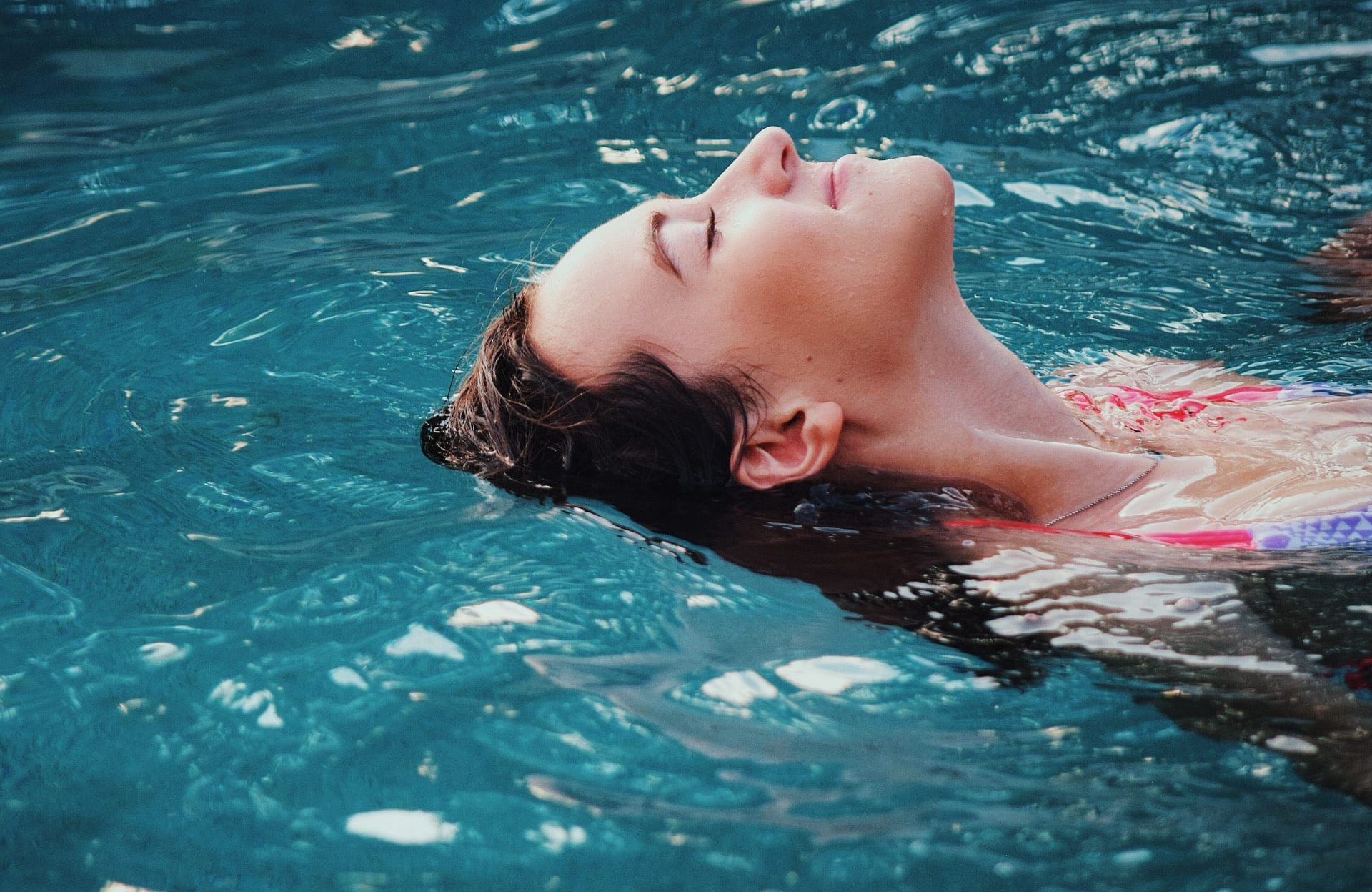 Woman relaxing in pool